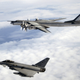 Illustration for article titled 27 high tension photos of NATO jets intercepting Russian warplanes